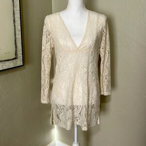 Cream colored lacey bathing suit cover up